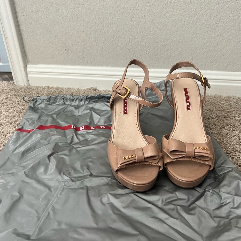 Prada - 7.5- Nude Patent Leather Wedge